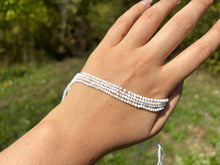 Charger l&#39;image dans la galerie, Perles en nacre blanche facettées entre 2 et 4mm
