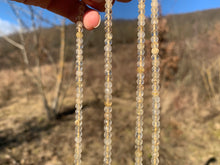 Charger l&#39;image dans la galerie, Perles en quartz rutile facettées 3 x 4mm
