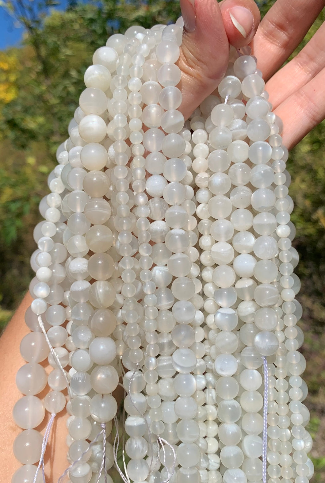 Perles en pierre de lune blanche entre 4 et 12mm PLBU