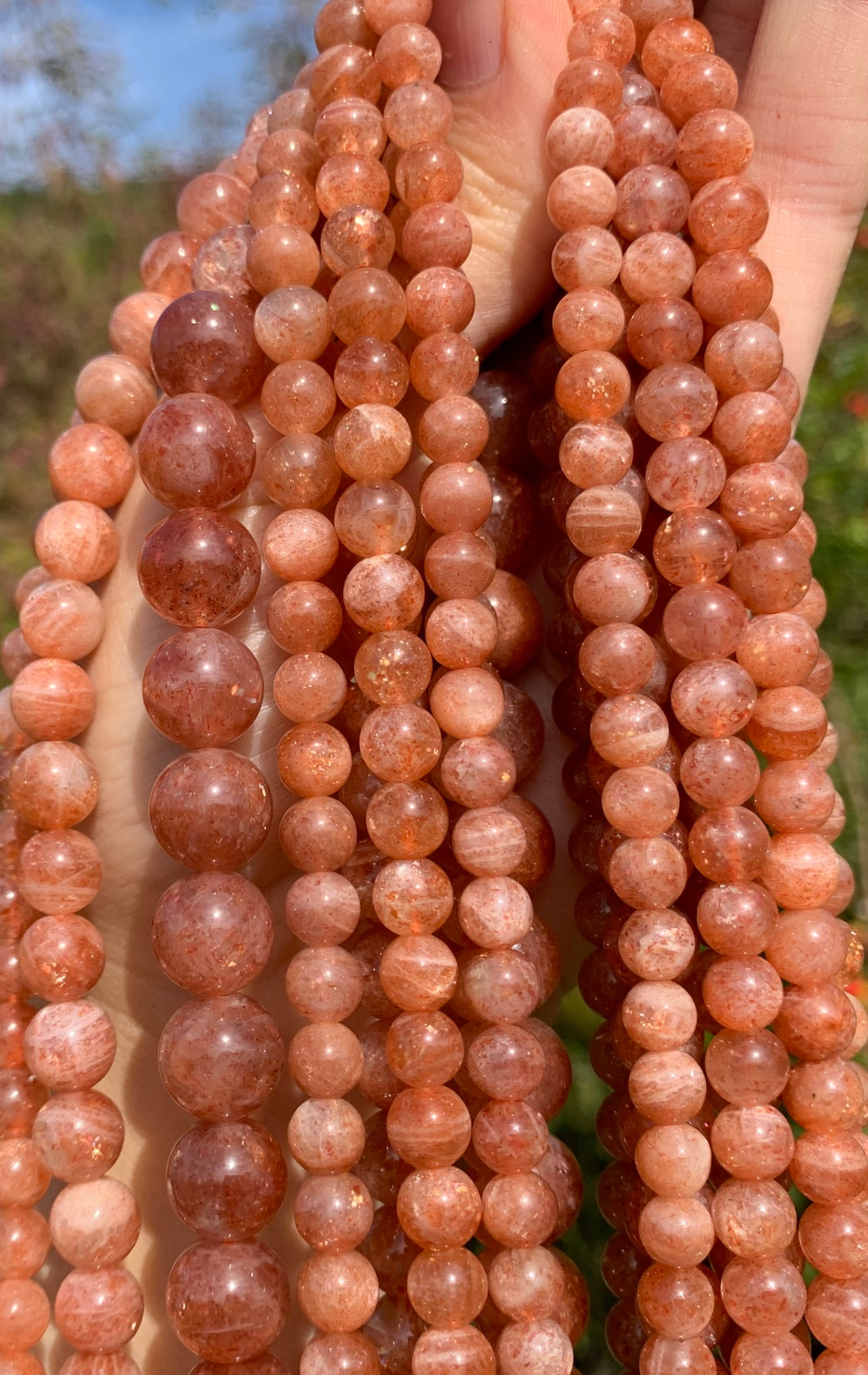 Perles en pierre de soleil entre 6 et 10mm