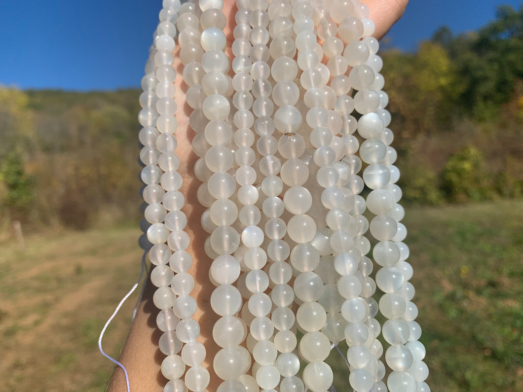 Perles en pierre de lune blanche entre 6 et 10mm PLBT