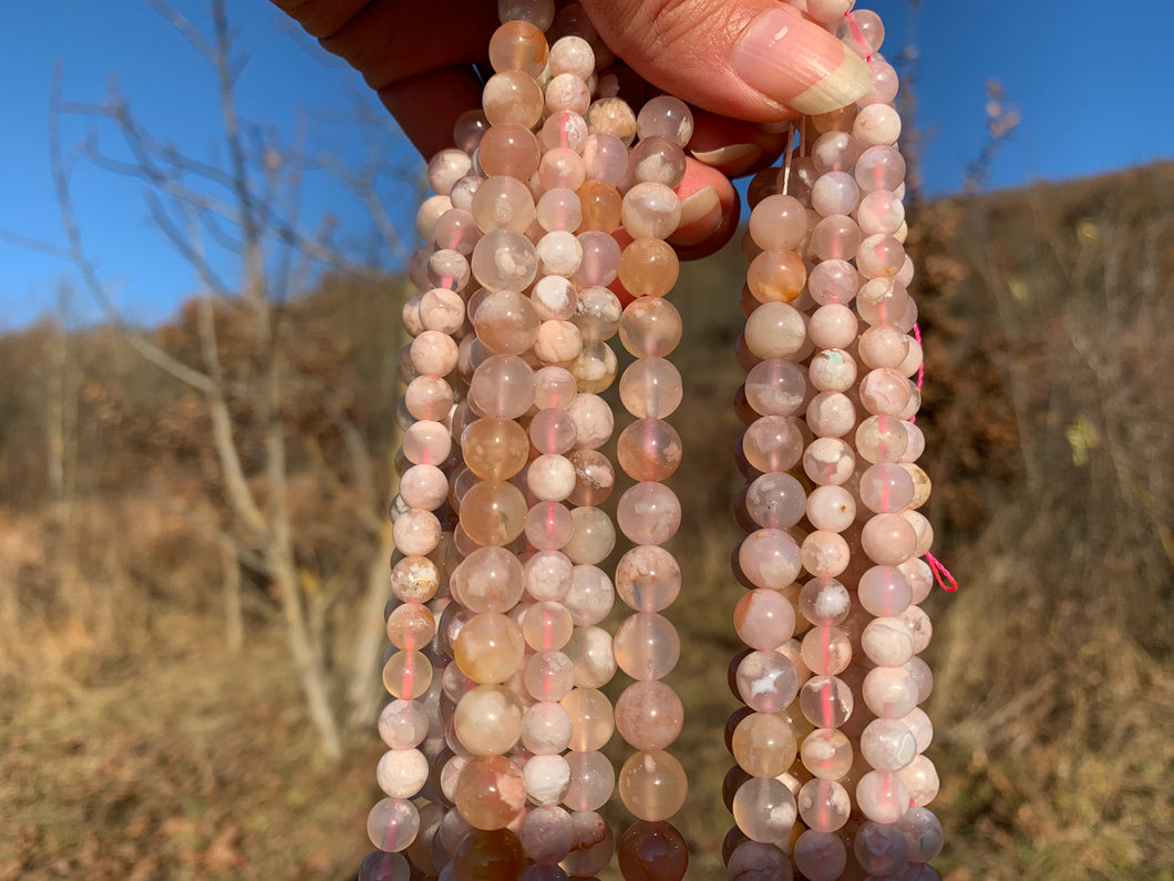 Perles en agate fleurie entre 6 et 10mm